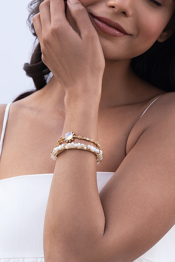 Gold Plated Brass Stack Bangles (Set Of 2) by AMAMA at Pernia's Pop Up Shop