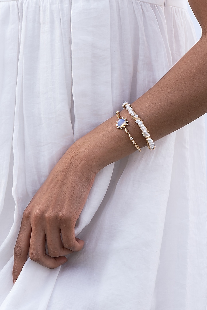 Gold Plated Brass Stack Bangles (Set Of 2) by AMAMA at Pernia's Pop Up Shop