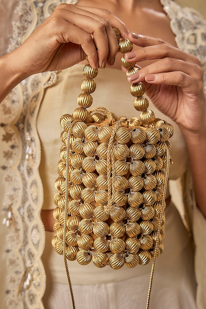 Light Gold Vegan Leather Zari Thread Embroidered Bucket Bag by AMAMA at Pernia's Pop Up Shop