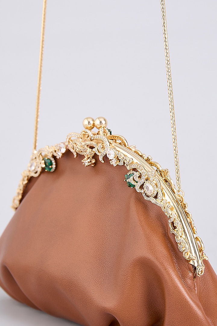 Tan Brass & Faux Leather Sling Bag by AMAMA at Pernia's Pop Up Shop