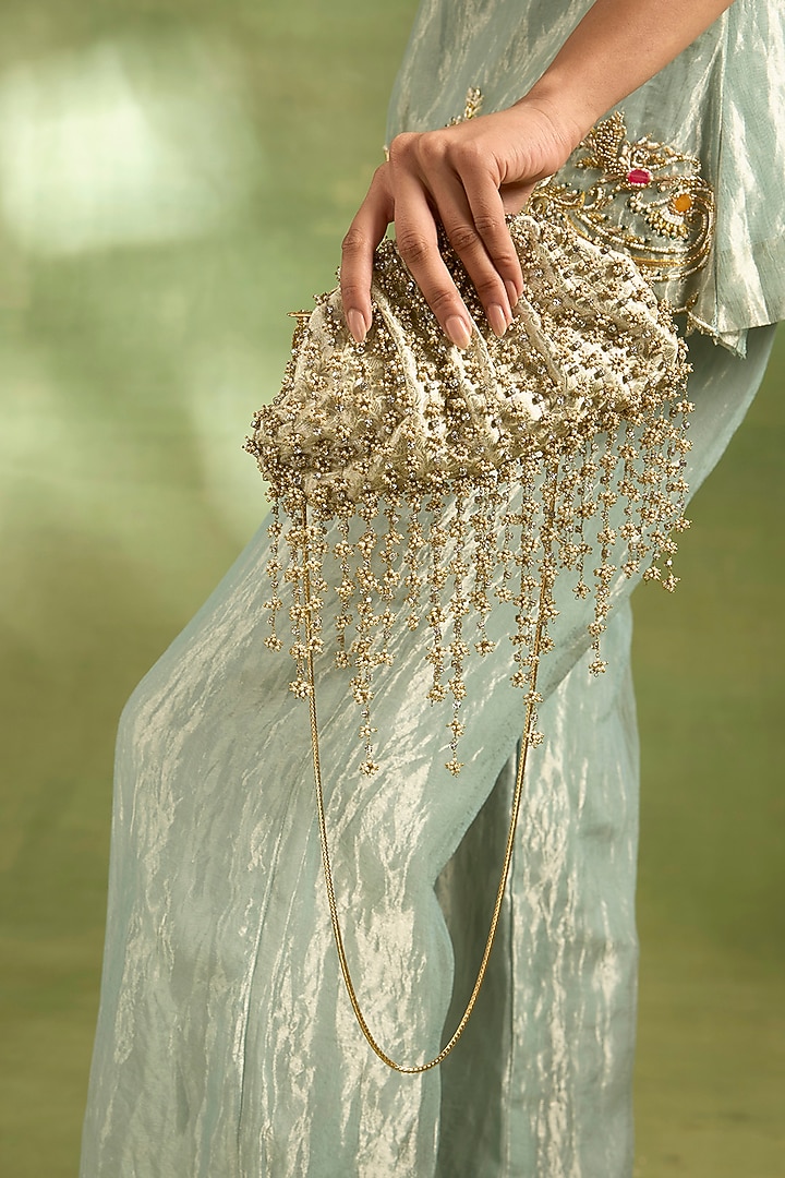 Ivory Brass Sling Bag by AMAMA at Pernia's Pop Up Shop