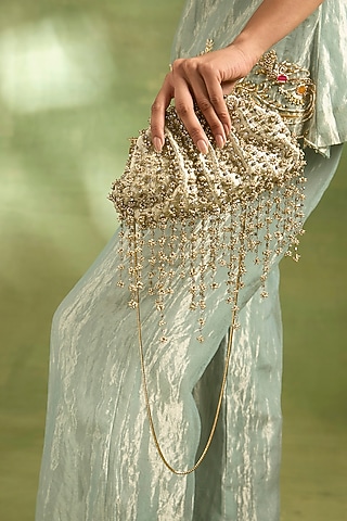 Ivory Brass Sling Bag by AMAMA