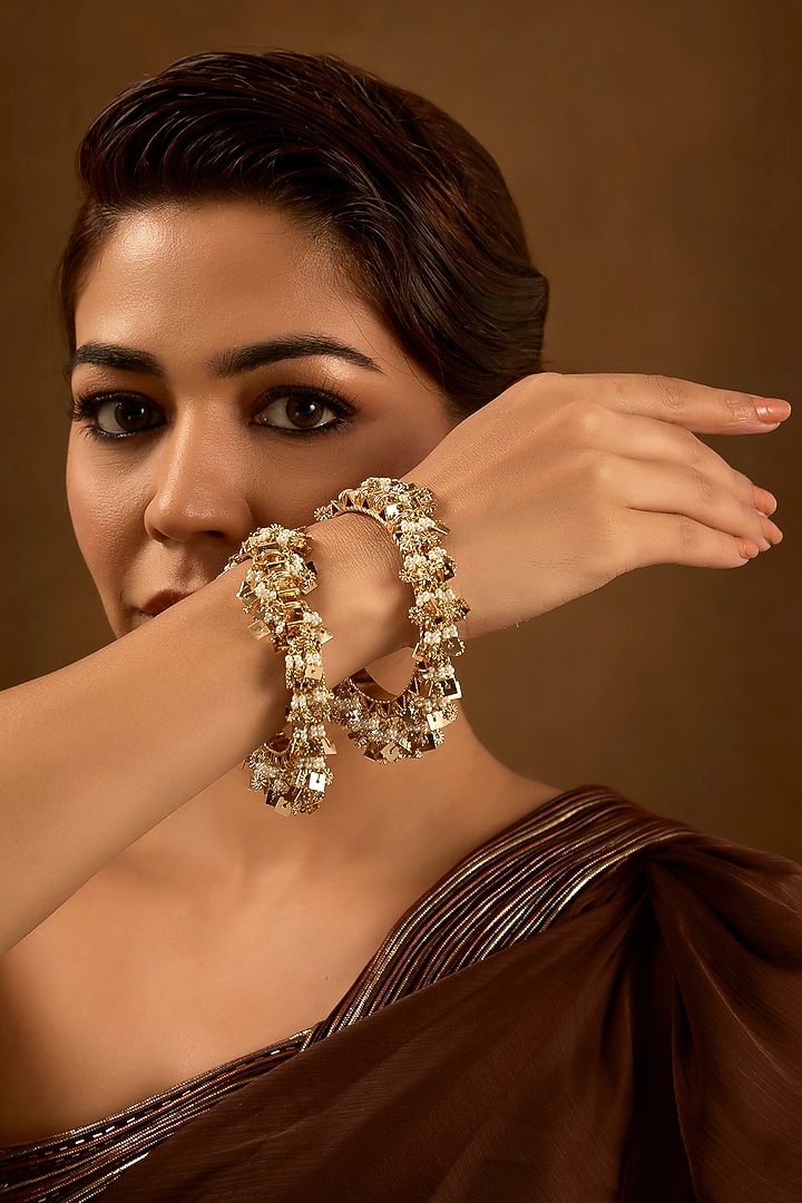 Gold Finish Brass Bangles (Set Of 2) by AMAMA at Pernia's Pop Up Shop