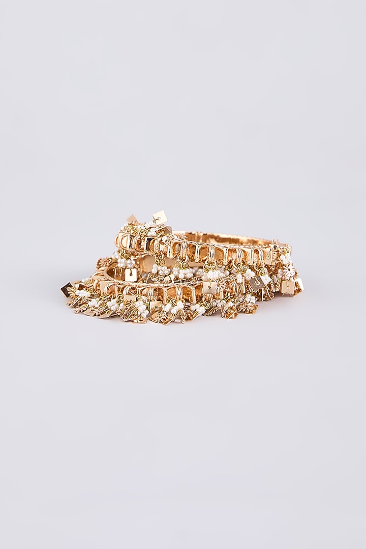 Gold Finish Brass Bangles (Set Of 2) by AMAMA at Pernia's Pop Up Shop