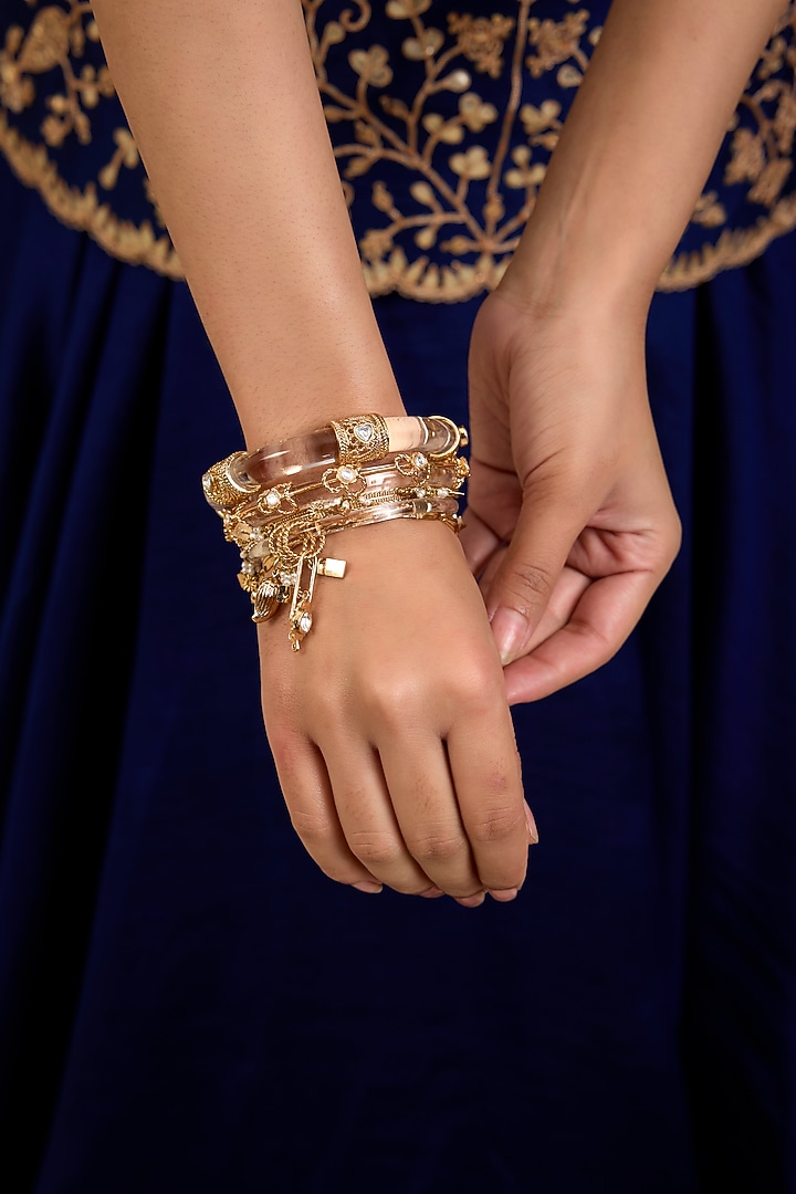 Gold Finish Mirror & Pearl Bangles (Set Of 5) by AMAMA at Pernia's Pop Up Shop