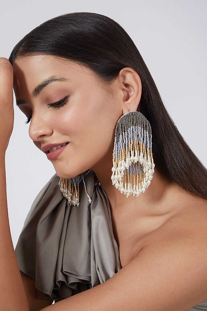 White Hand Embroidered Long Earrings by AMAMA at Pernia's Pop Up Shop