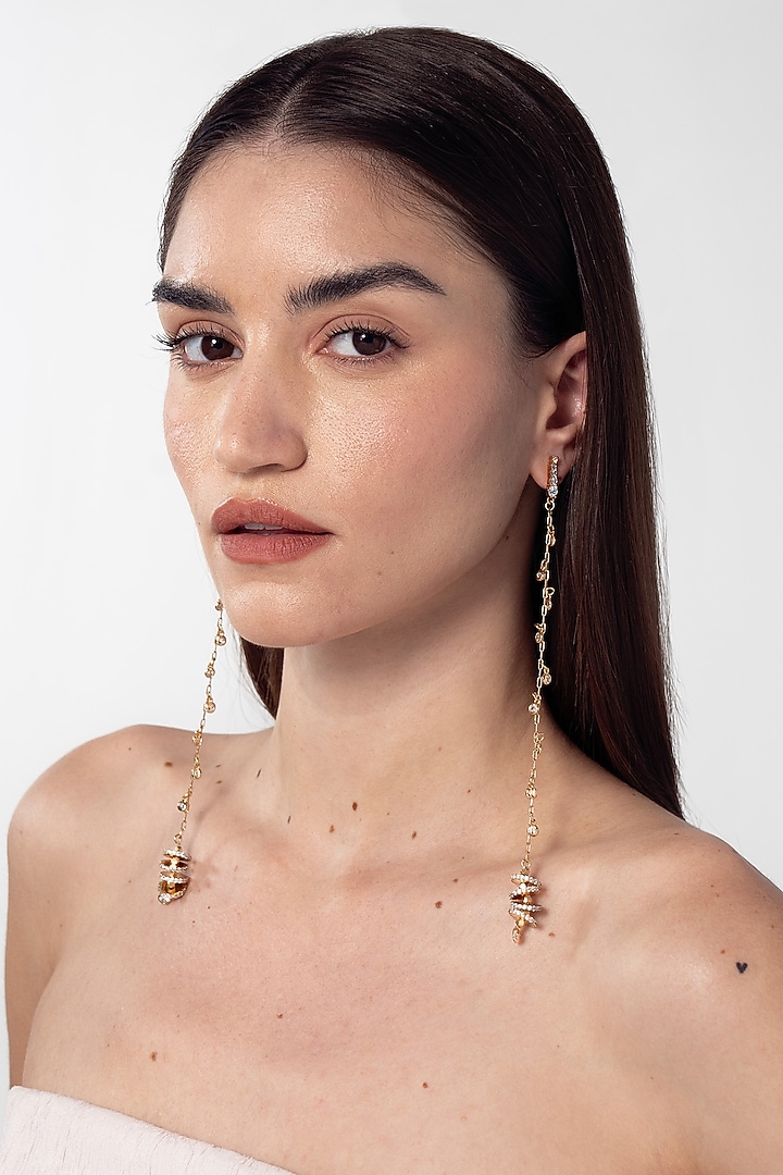 Gold Finish Cubic Zirconia Linear Earrings by AMAMA at Pernia's Pop Up Shop