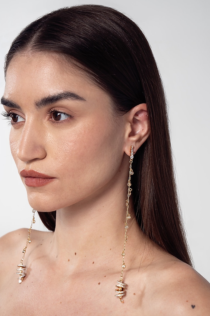 Gold Finish Cubic Zirconia Linear Earrings by AMAMA at Pernia's Pop Up Shop