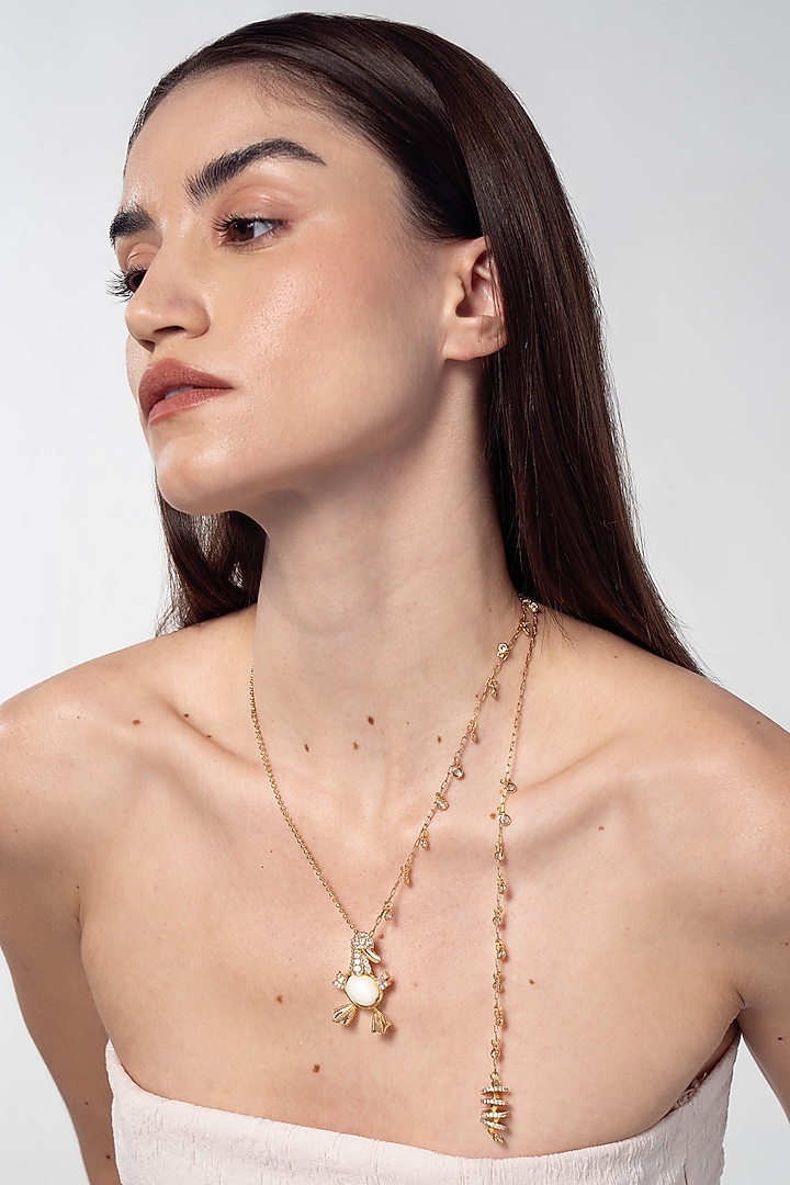 Gold Finish Cubic Zirconia Ducklet Necklace by AMAMA at Pernia's Pop Up Shop
