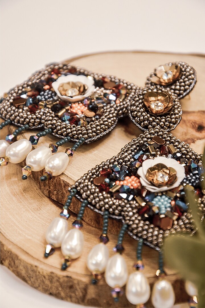 Black Hand Embroidered Earrings by AMAMA at Pernia's Pop Up Shop
