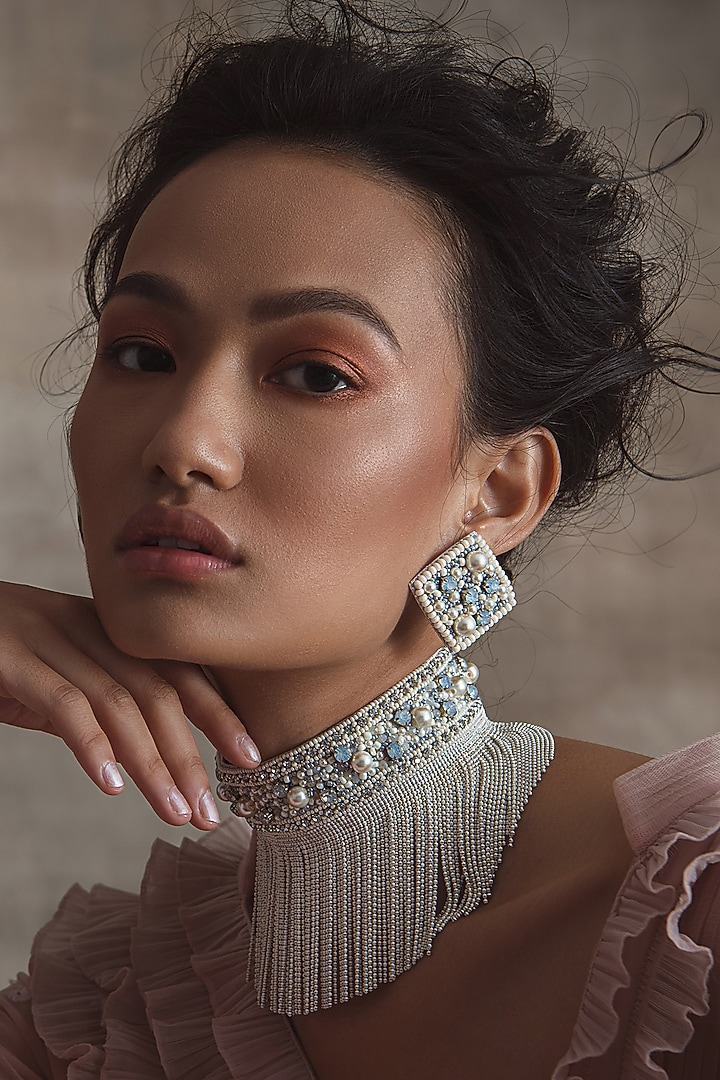 White Glass Hand Embroidered Stud Earrings by AMAMA at Pernia's Pop Up Shop