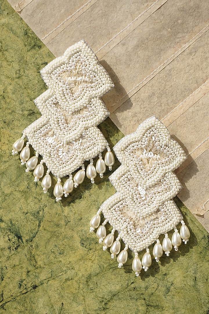 White Hand Embroidered Earrings by AMAMA at Pernia's Pop Up Shop