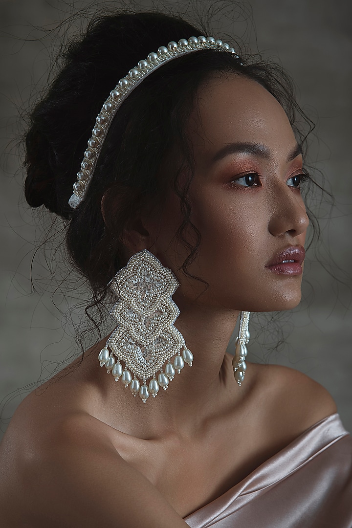 White Hand Embroidered Earrings by AMAMA at Pernia's Pop Up Shop
