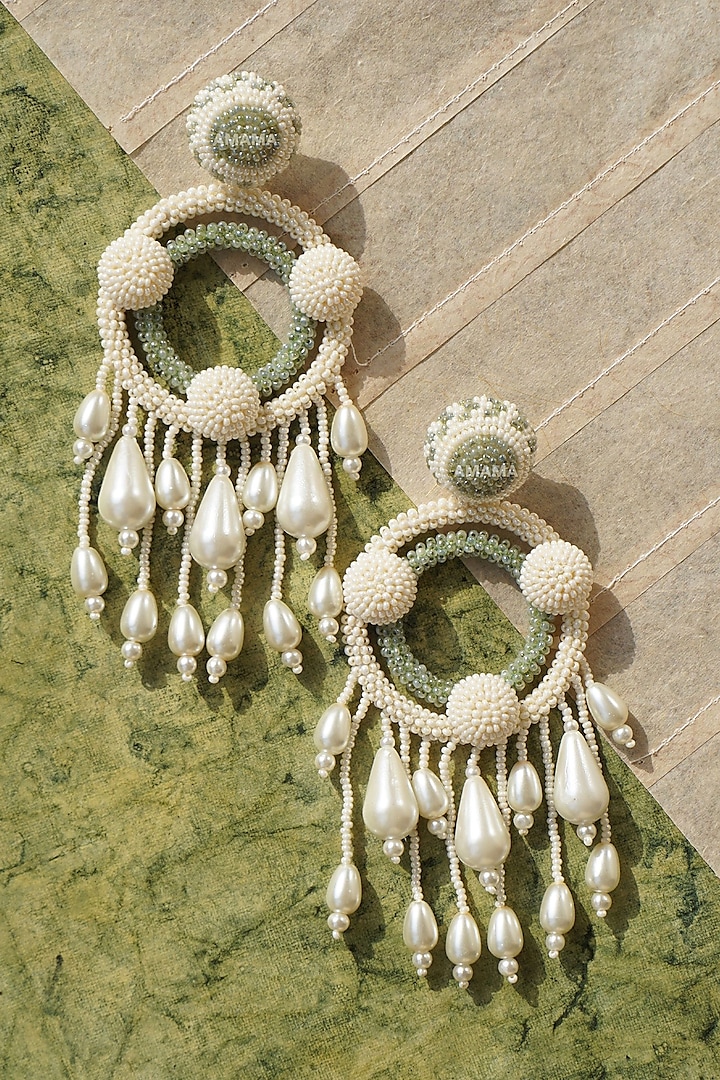 White Long Earrings With Hand Embroidery by AMAMA