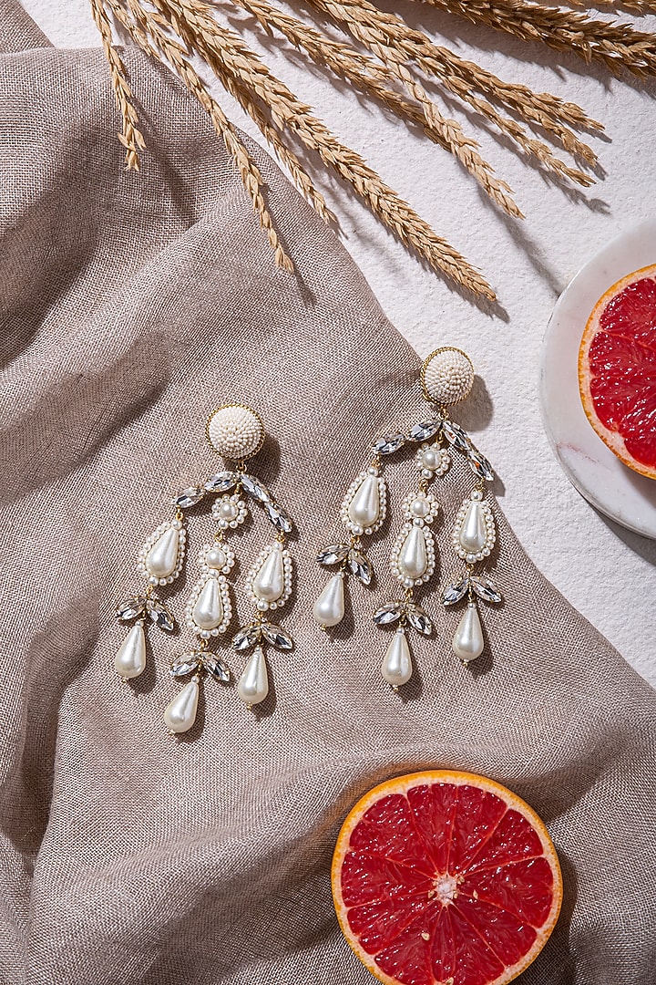 White Dangler Earrings With Embroidery by AMAMA at Pernia's Pop Up Shop