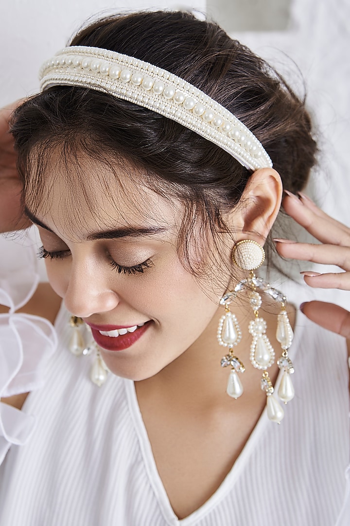 White Dangler Earrings With Embroidery by AMAMA at Pernia's Pop Up Shop