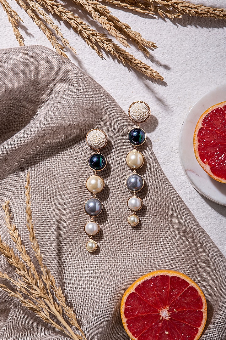 White Dangler Earring With Metal Work by AMAMA at Pernia's Pop Up Shop