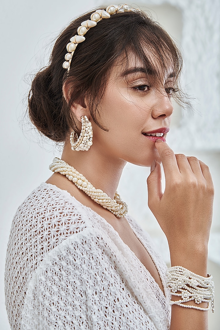 White Beads Embroidered Hoop Earrings by AMAMA at Pernia's Pop Up Shop