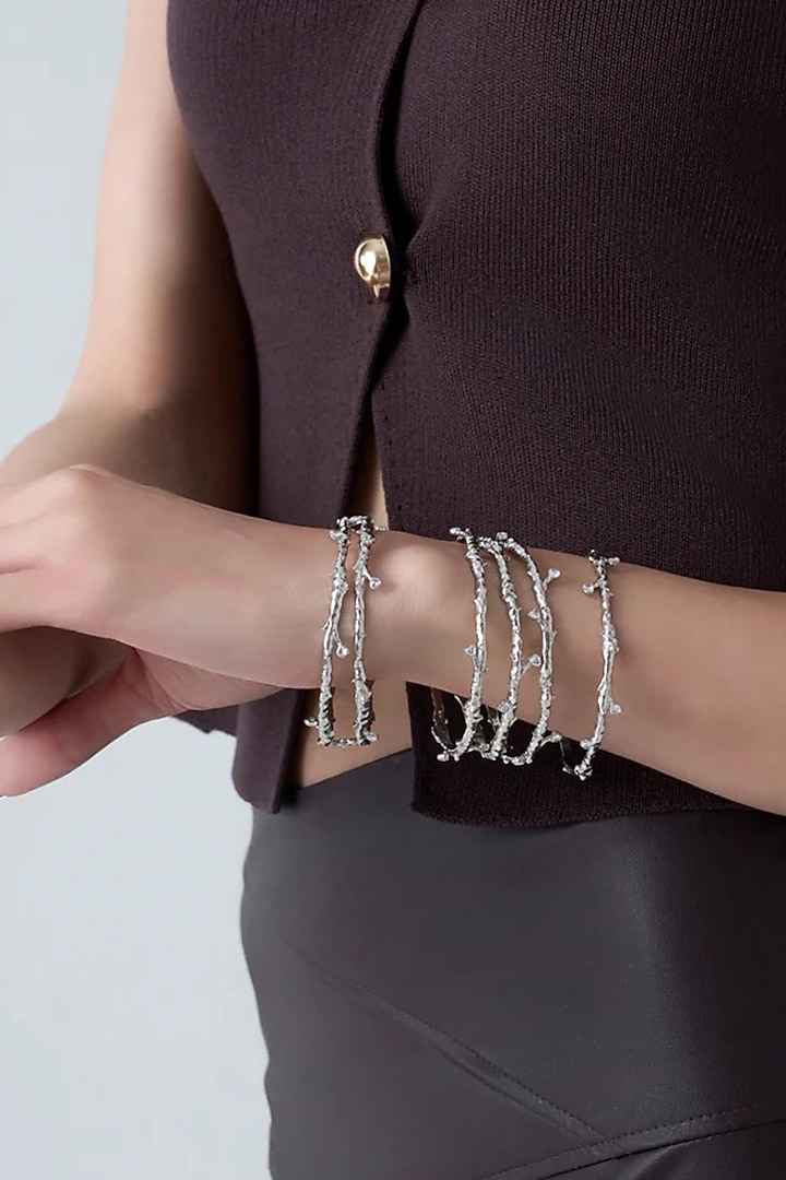 Silver Chrome Finish Brass Alloy Bangles (Set Of 6) by AMAMA at Pernia's Pop Up Shop