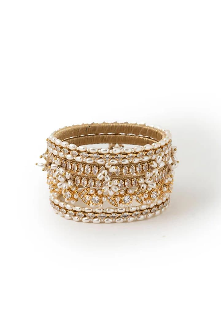Gold Plated Cubic Zirconia & Faux Pearl Bangles (Set Of 5) by AMAMA at Pernia's Pop Up Shop