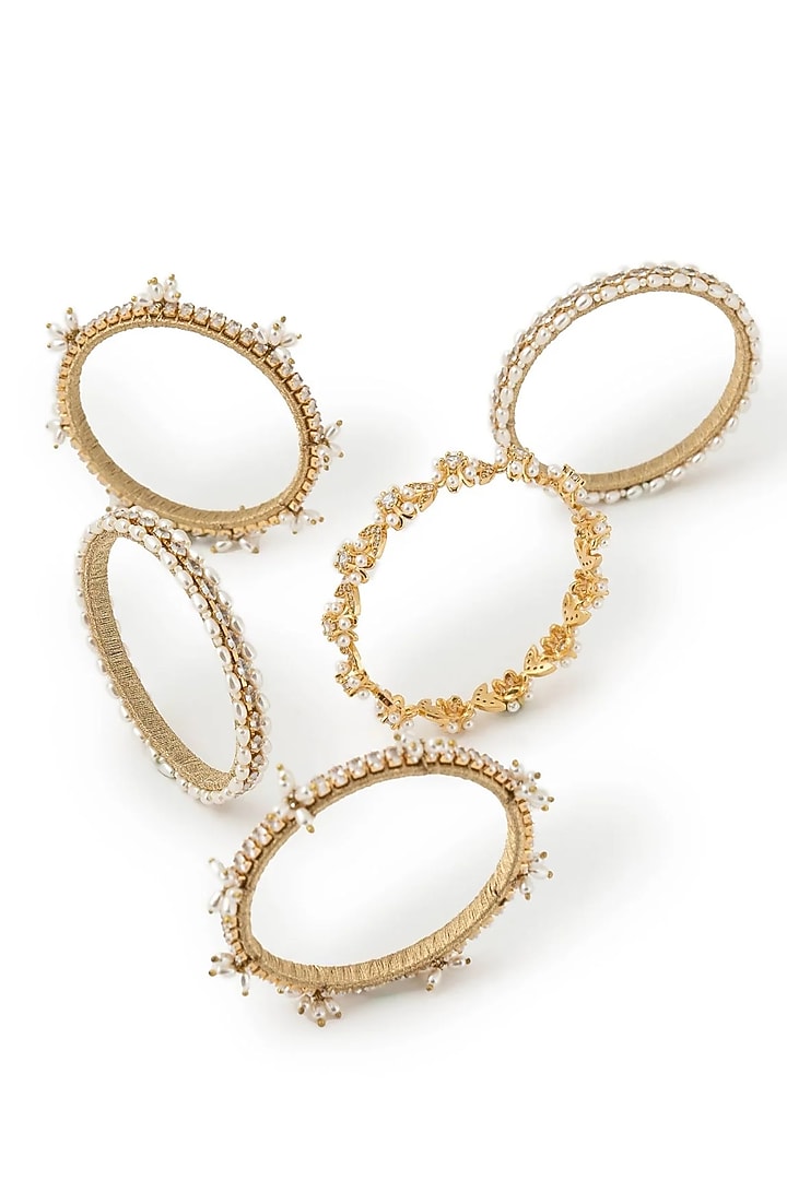 Gold Plated Cubic Zirconia & Faux Pearl Bangles (Set Of 5) by AMAMA at Pernia's Pop Up Shop