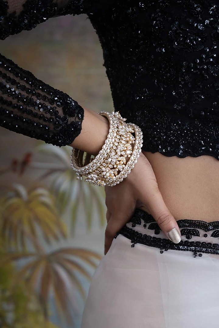 Gold Plated Cubic Zirconia & Faux Pearl Bangles (Set Of 5) by AMAMA at Pernia's Pop Up Shop