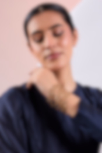 Gold Finish Cubic Zirconia Crest Bangles (Set Of 6) by AMAMA at Pernia's Pop Up Shop