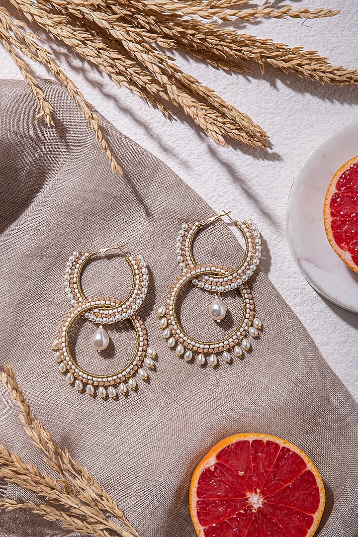 Beige Hand Embroidered Long Earrings by AMAMA at Pernia's Pop Up Shop