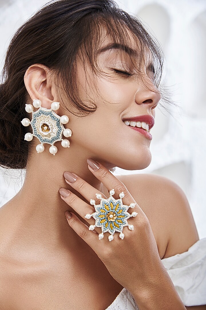 White Hand Embroidered Stud Earrings by AMAMA at Pernia's Pop Up Shop