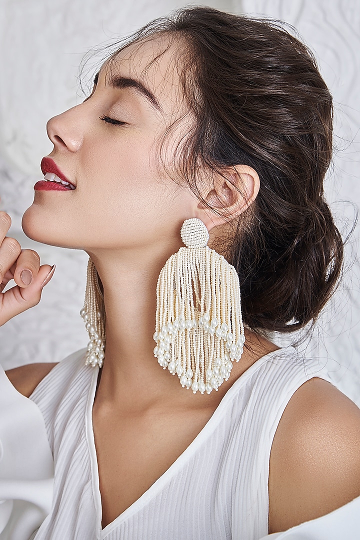 White Hand Embroidered Earrings by AMAMA at Pernia's Pop Up Shop