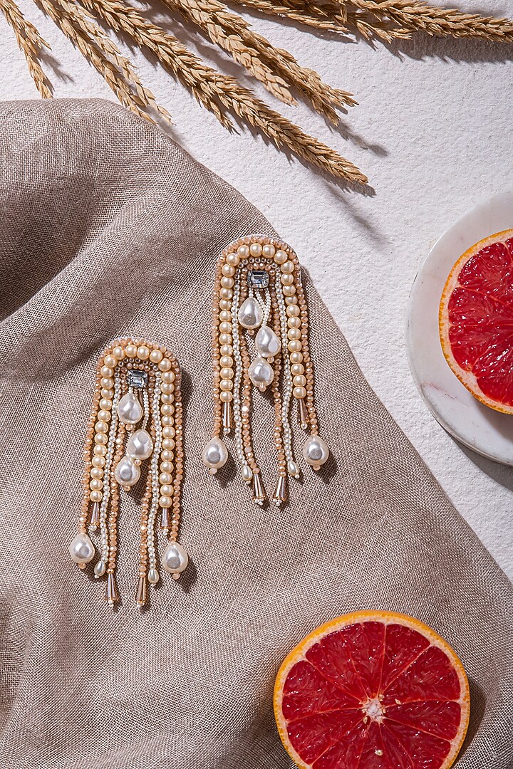 Beige Hand Embroidered Earrings by AMAMA at Pernia's Pop Up Shop