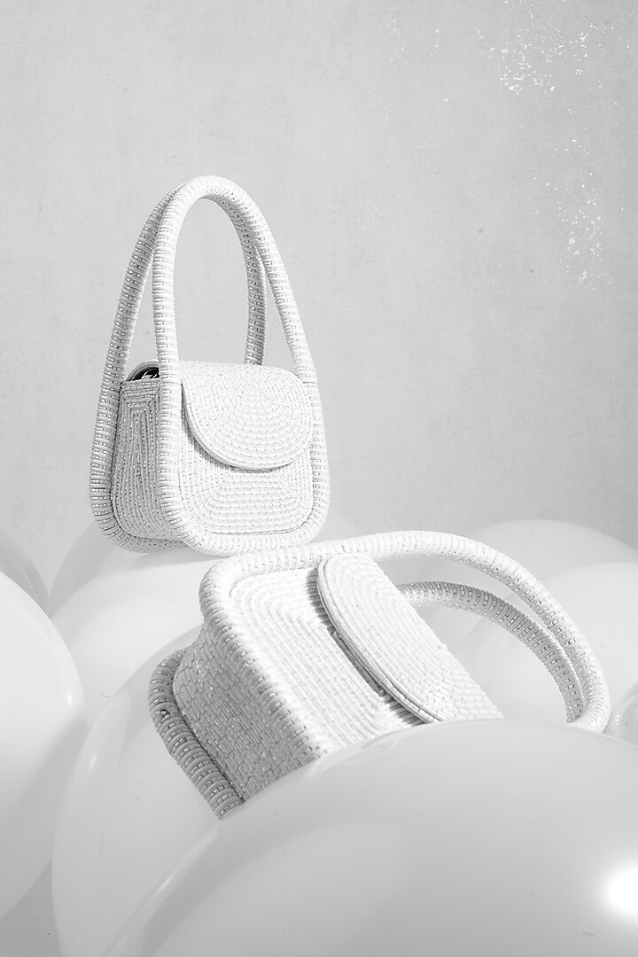 White Faux Leather & Velvet Embellished Mini Clutch by AMAMA at Pernia's Pop Up Shop