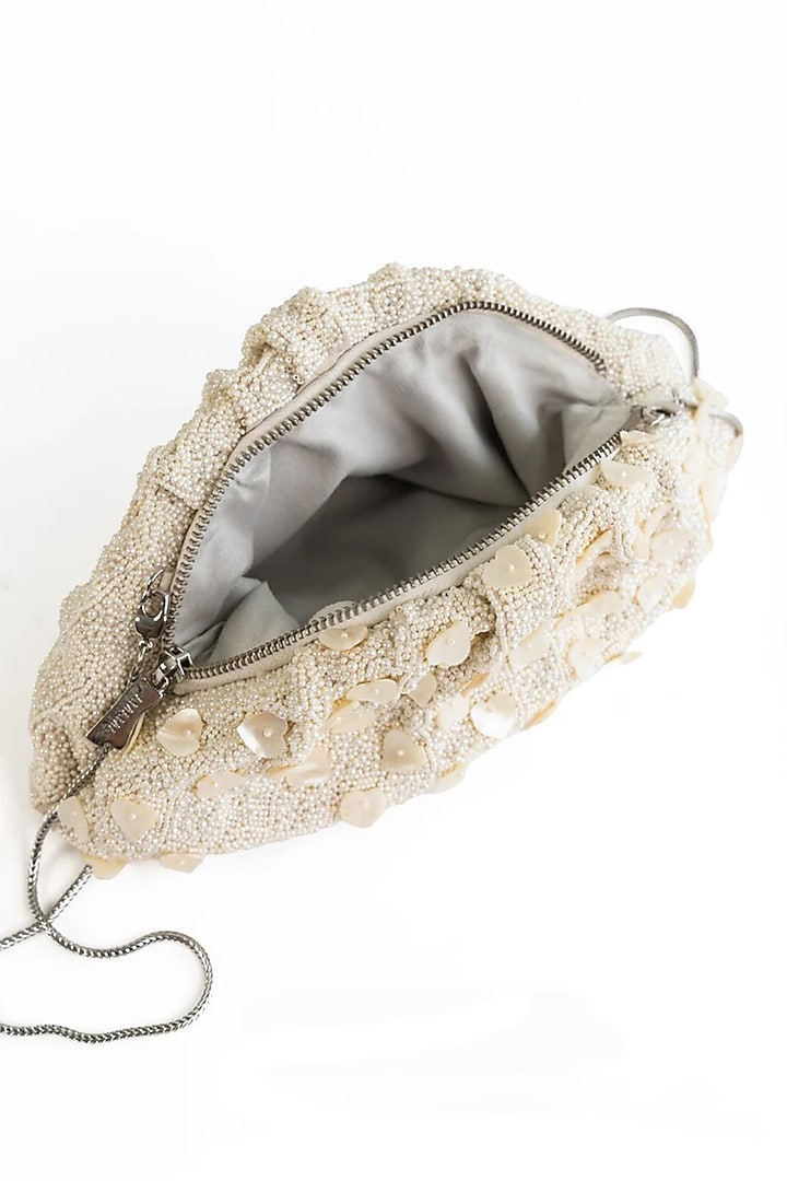 Ivory Suede Glass Bead & Zari Embroidered Bag by AMAMA at Pernia's Pop Up Shop