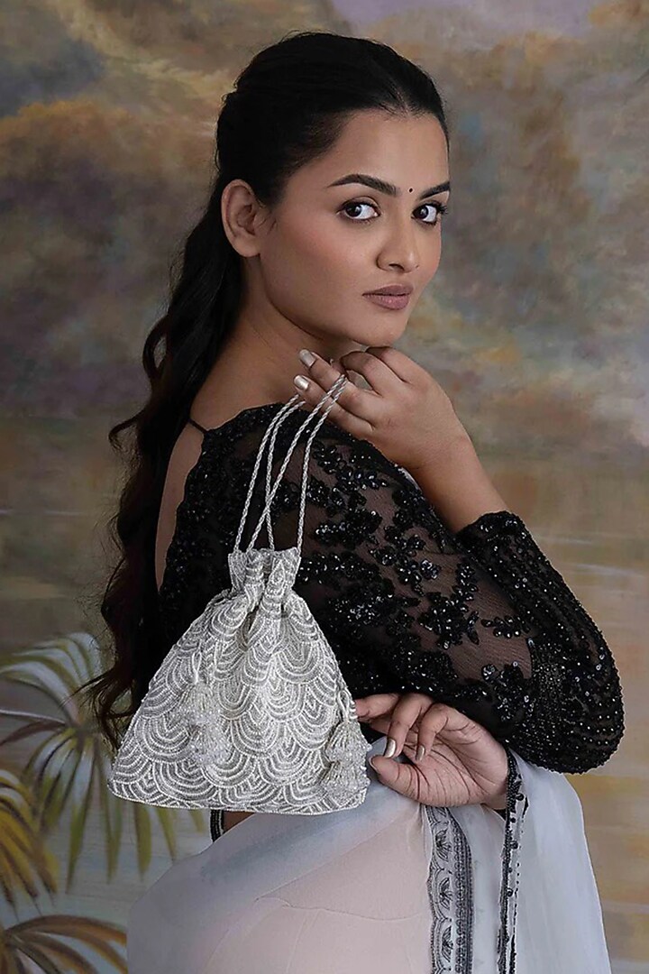 Ivory Suede Glass Bead & Zari Embroidered Potli Bag by AMAMA at Pernia's Pop Up Shop