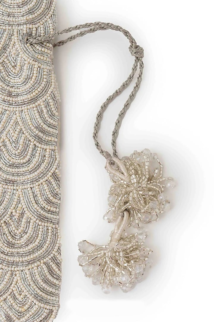 Ivory Suede Glass Bead & Zari Embroidered Potli Bag by AMAMA at Pernia's Pop Up Shop