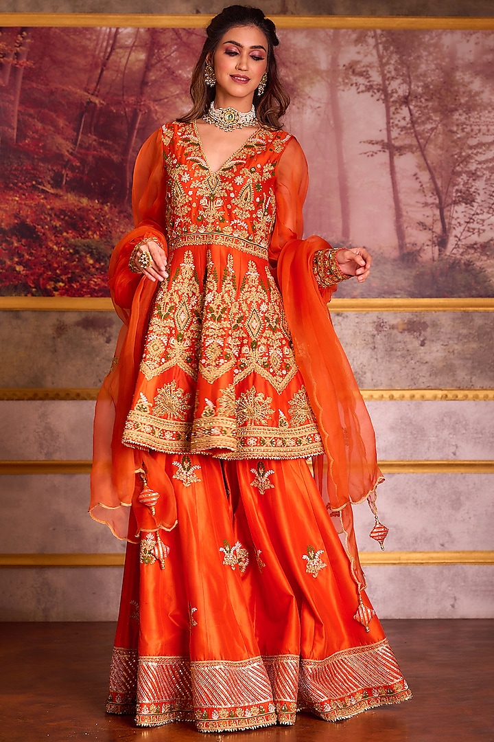 Heavy Orange Dupion Silk Machine & Hand Embroidered Sharara Set by AMAN TAKYAR