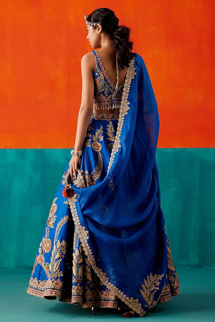 Electric Blue Dupion Silk & Organza Floral Thread Embroidered Bridal Lehenga Set by AMAN TAKYAR at Pernia's Pop Up Shop