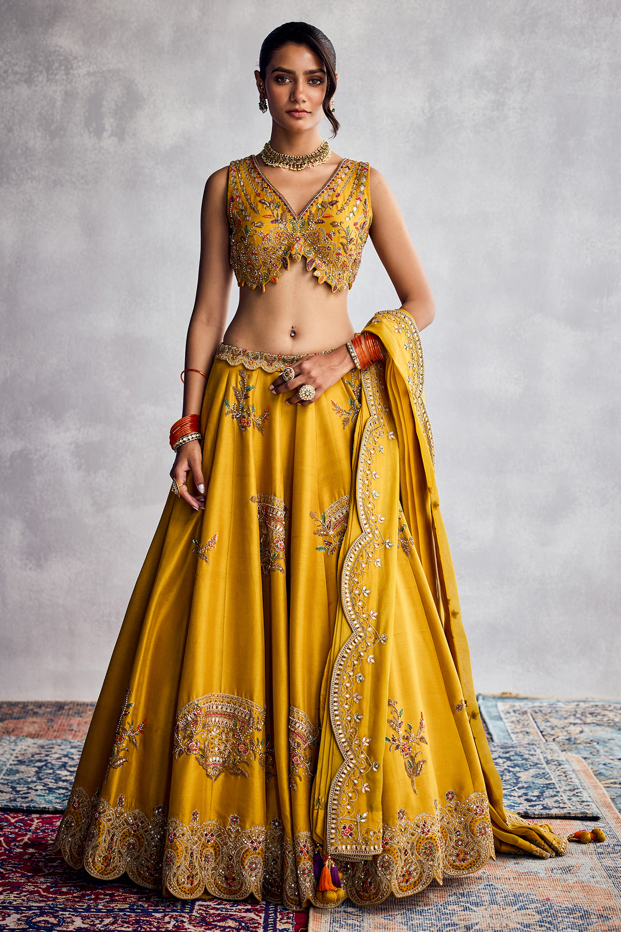 Spectra Yellow Dupion Silk Thread Embroidered Wedding Lehenga Set by AMAN TAKYAR at Pernia's Pop Up Shop
