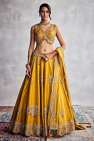 Spectra Yellow Dupion Silk Thread Embroidered Lehenga Set by AMAN TAKYAR