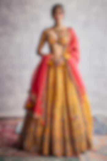 Marigold Raw Silk Floral Hand Embroidered Bridal Lehenga Set by AMAN TAKYAR at Pernia's Pop Up Shop