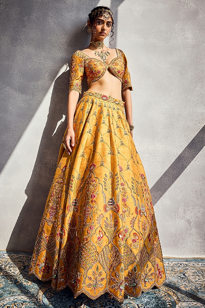 Marigold Raw Silk Floral Hand Embroidered Bridal Lehenga Set by AMAN TAKYAR at Pernia's Pop Up Shop