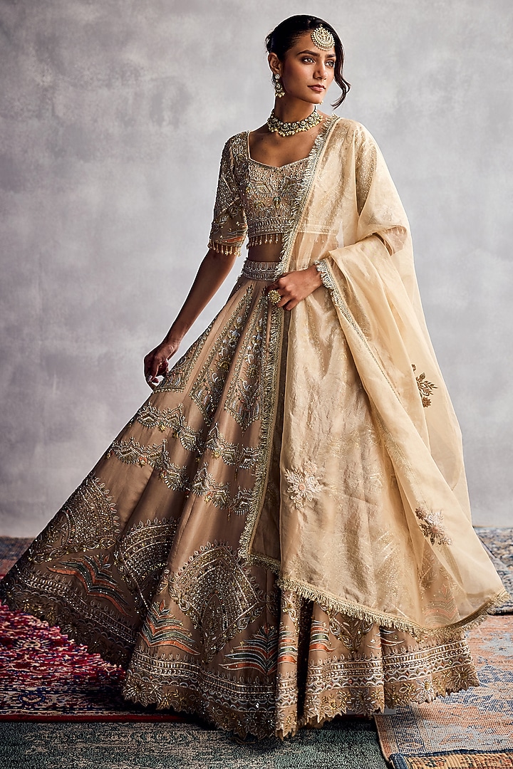 Ivory Dupion Silk Embroidered Bridal Lehenga Set by AMAN TAKYAR at Pernia's Pop Up Shop