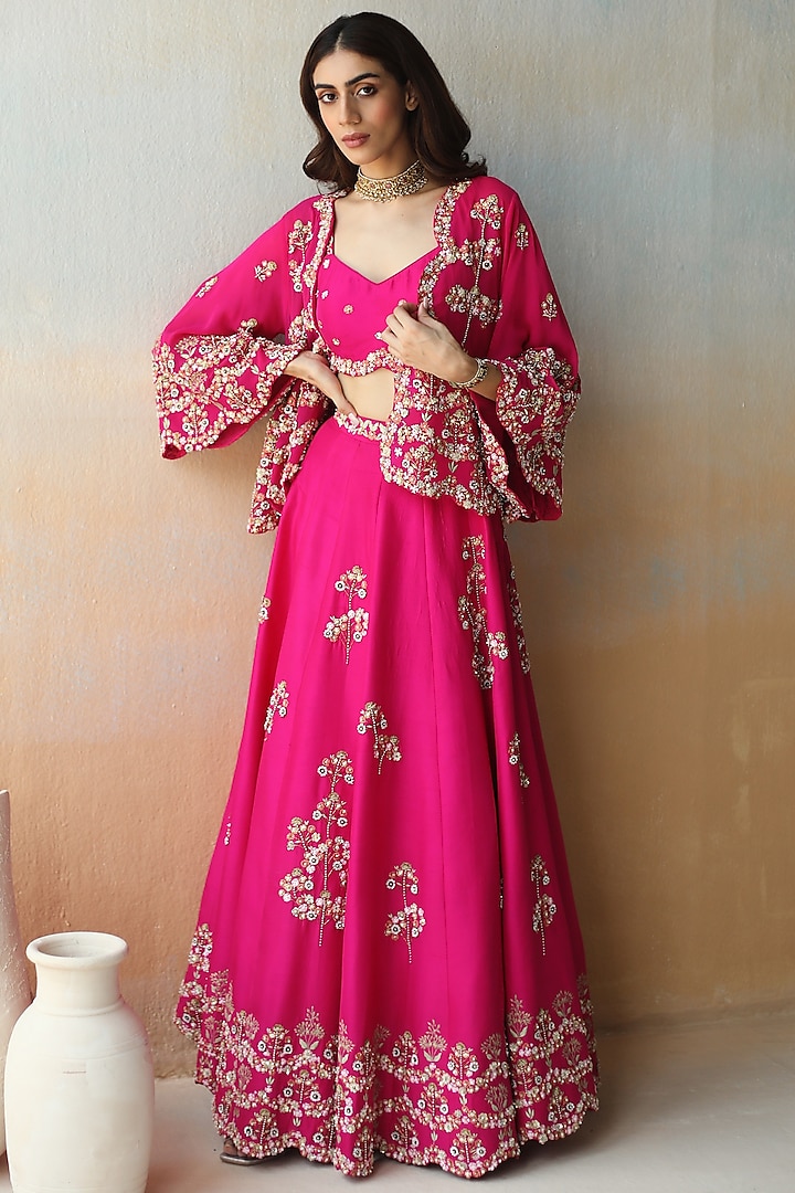 Fuchsia Pink Embroidered Lehenga Set by AMAN TAKYAR