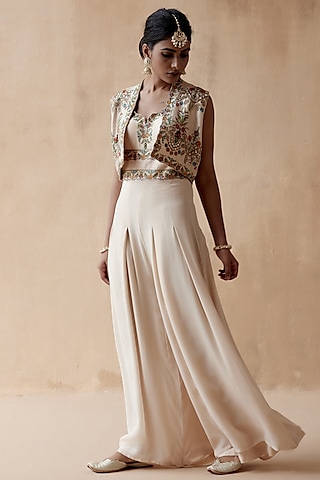 Ivory Raw Silk & Georgette Embellished Jumpsuit With Jacket by AMAN TAKYAR