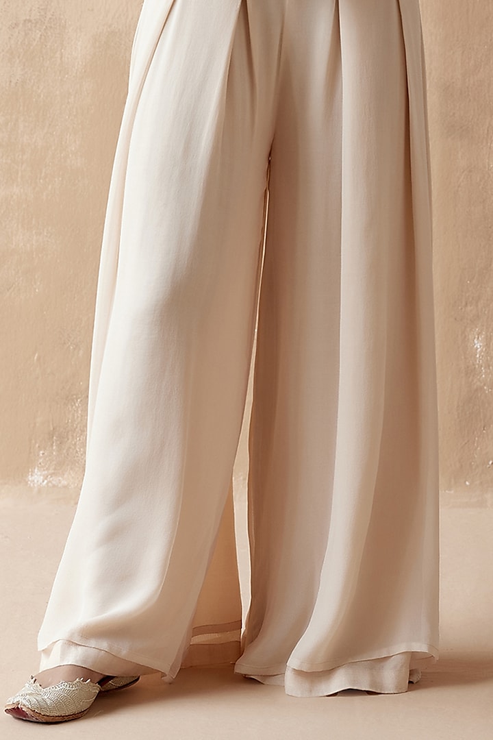 Ivory Raw Silk & Georgette Embellished Jumpsuit With Jacket by AMAN TAKYAR at Pernia's Pop Up Shop