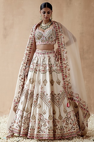 Ivory Dupion Silk Embellished Lehenga Set by AMAN TAKYAR