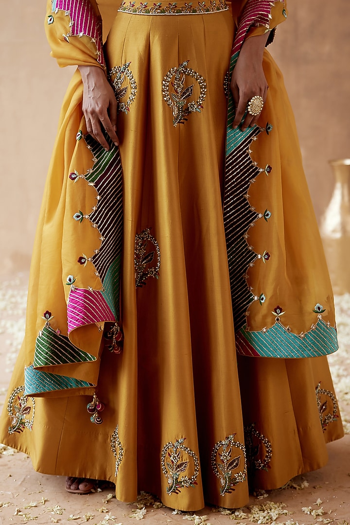 Mustard Dupion Silk Embellished Bridal Lehenga Set by AMAN TAKYAR at Pernia's Pop Up Shop