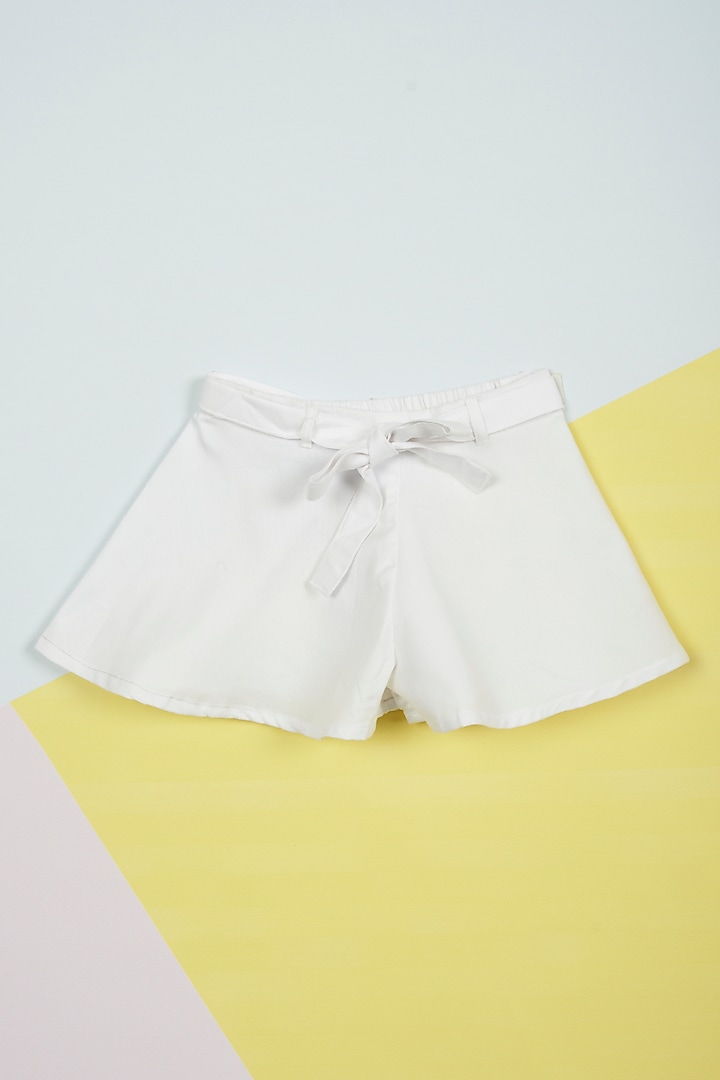 White Dobby Flared Shorts For Girls by Ambar at Pernia's Pop Up Shop