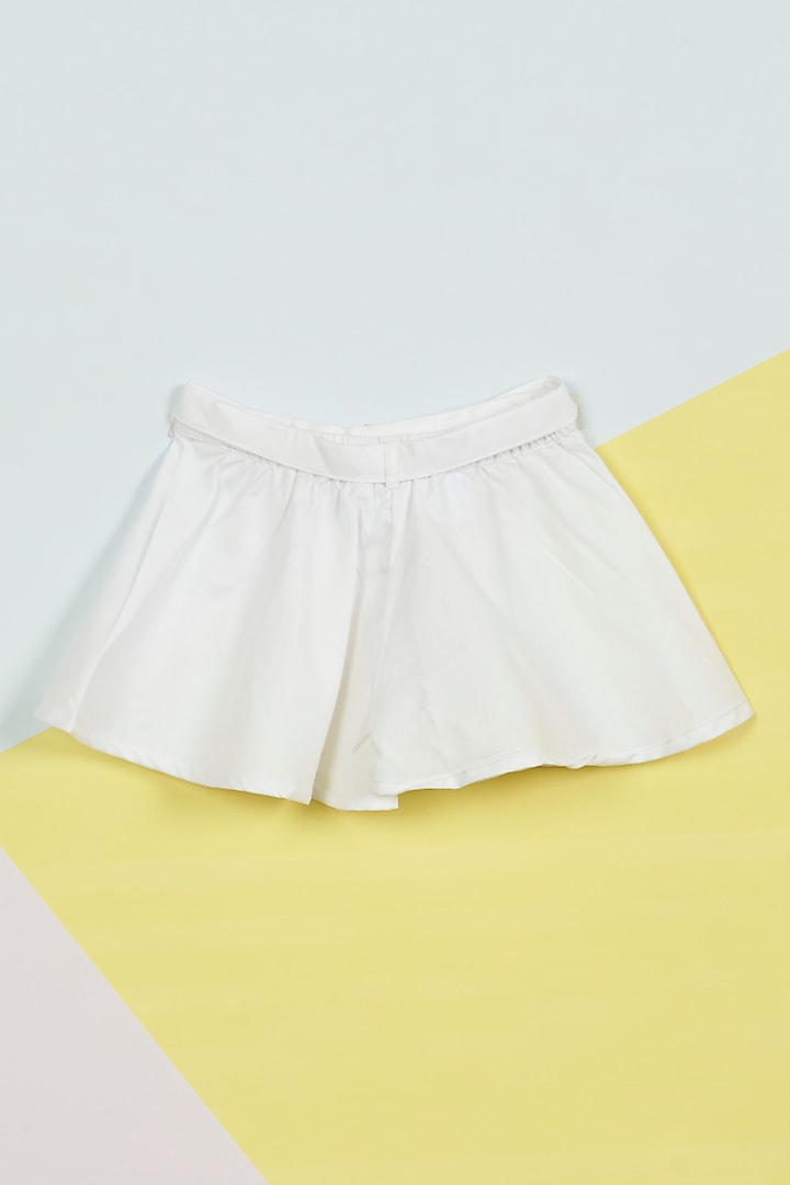 White Dobby Flared Shorts For Girls by Ambar at Pernia's Pop Up Shop