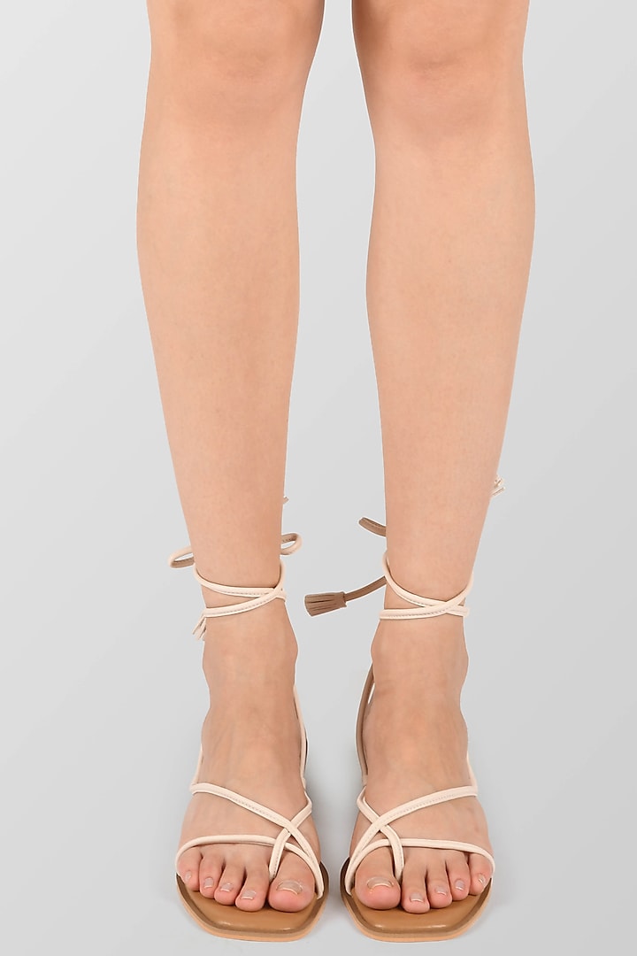 White Strappy Sandals With Tassels by Ame